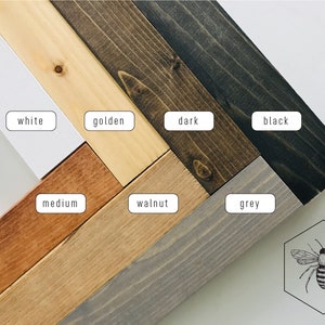 May include: Wood samples in various colors, including white, golden, dark, black, medium, walnut, and grey. The samples are arranged in a diagonal pattern. The image includes the text "nine three seven".
