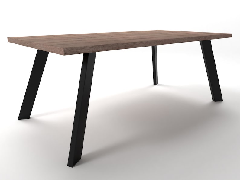 May include: A rectangular wooden table with a brown wood top and black metal legs. The legs are angled and have a modern design.