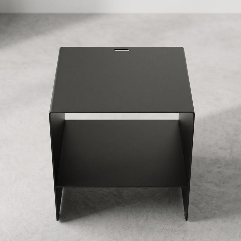 Handmade metal nightstand by Taormina Design, featuring a clean cubic shape, integrated middle shelf and premium powder-coated finish, perfect as a black industrial bedside table, side table or compact storage unit for modern bedrooms