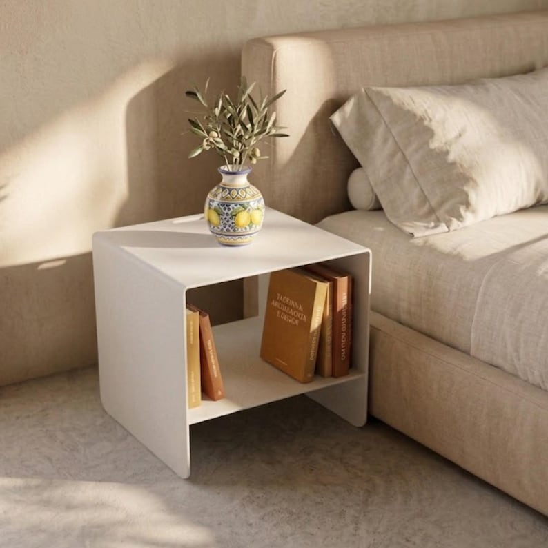 Premium steel bedside table with open shelf and architectural cube design, handcrafted by Taormina Design from 4 mm metal sheet, ideal for customers looking for a durable industrial nightstand, modern side table or minimalist bedroom accent.