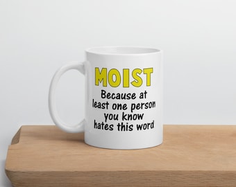 Funny the word moist ceramic mug.  Sarcastic humor gross words gift mug.