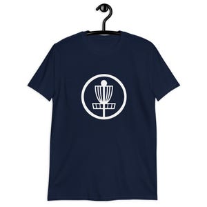 Navy blue t-shirt with an image of disc golf basket silhouette with a circle around it printed on the front.
