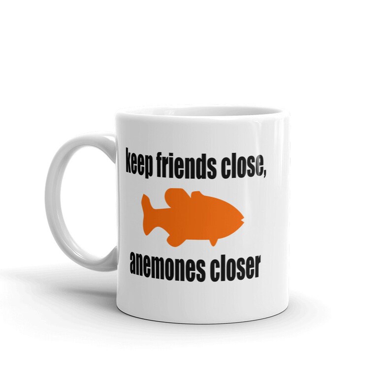 Sea anemone pun mug. Keep friends close, anemones closer. Friends and enemies funny pun dad joke mug. 11 Fluid ounces