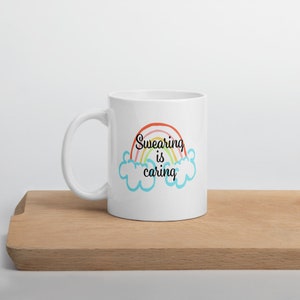 Swearing is caring rainbow mug. Funny profanity I swear a lot ceramic mug