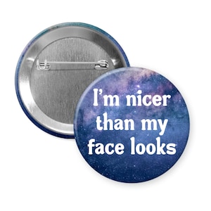 I'm nicer than my face looks pin-back button or magnet