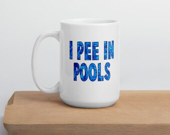Funny swimmer joke ceramic mug. I pee in pools sarcastic gag gift mug.
