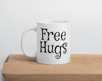 Free hugs ceramic mug. I'm a hugger. Cute funny mug gift.