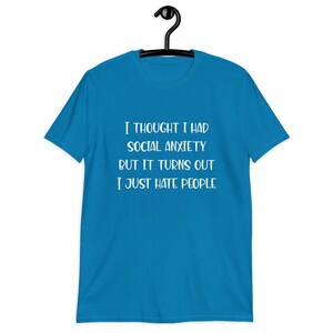 Sapphire blue t-shirt with the phrase I thought I had social anxiety but it turns out I just hate people printed on the front.