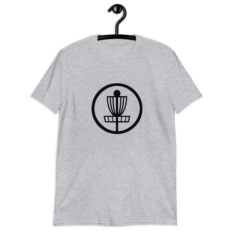 Sport grey t-shirt with an image of disc golf basket silhouette with a circle around it printed on the front.