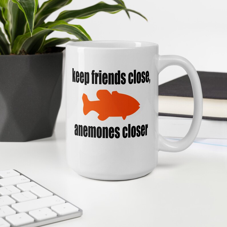 Sea anemone pun mug. Keep friends close, anemones closer. Friends and enemies funny pun dad joke mug. image 4