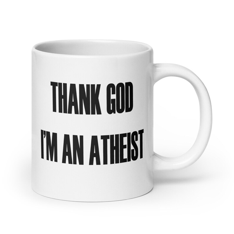 20 ounce white ceramic mug with the Thank God Im an Atheist printed on both sides.