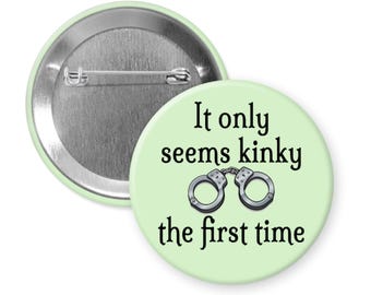 Kinky magnet or pinback button. It only seems kinky the first time pin