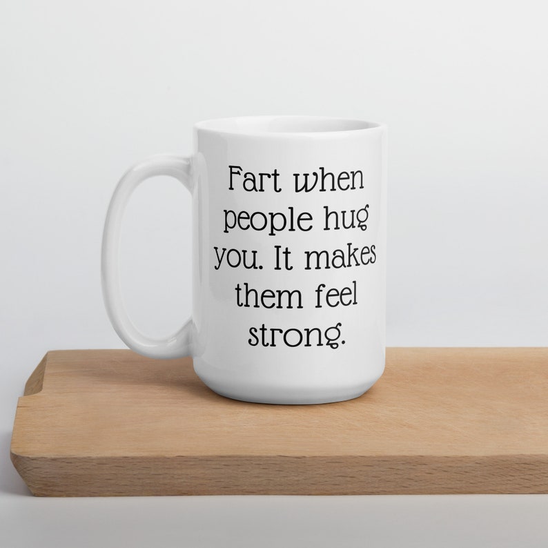 Fart jokes mug. Fart when people hug you it makes them feel strong sarcastic motivational gift. image 1