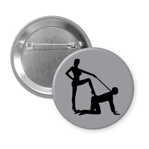 Dominatrix pinback button or magnet.