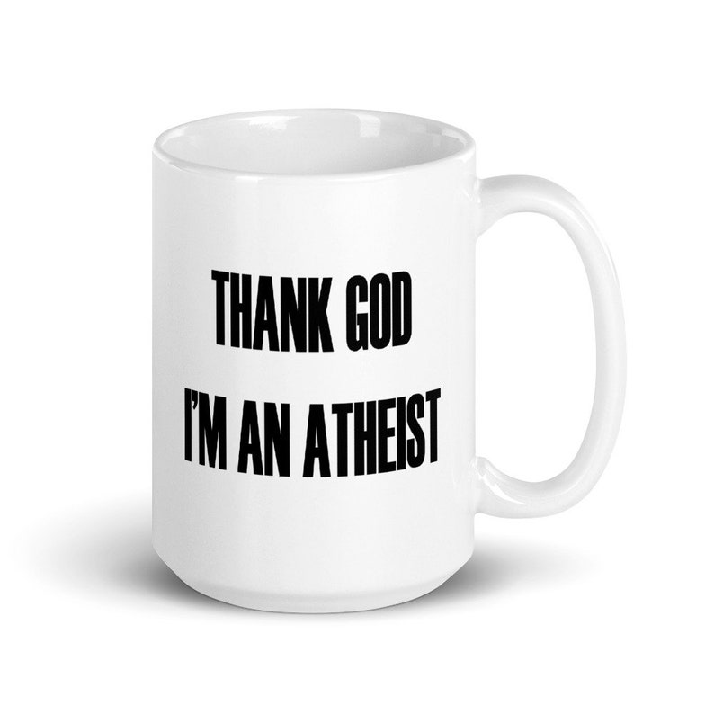 15 ounce white ceramic mug with the Thank God Im an Atheist printed on both sides.