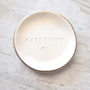 Custom ceramic jewelry bowl with engraved name and heart, gold rim white ring holder dish, engagement ring dish wedding keepsake, bridesmaid gift, daughter birthday gift, dorm room decor, office desk trinket tray, mens valet tray, vanity earring bowl