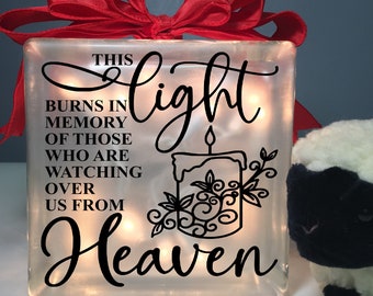 This light burns in memory of those who are watching over us from Heaven personalized LightBoxGifts glass cube memorial light