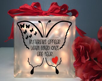 Butterflies appear when loved ones are near lighted glass block,  block, memorial condolence sympathy in memory loss