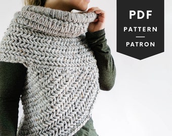 May include: A gray and white crochet cowl with a herringbone stitch pattern. The cowl is worn by a person with a green shirt. The text "PDF PATTERN PATRON" is in the upper right corner of the image.