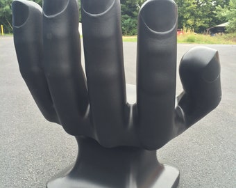 Giant hand shaped chair cheap