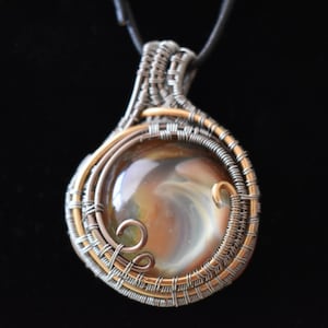 Wire Wrapped Glass Cab image 1