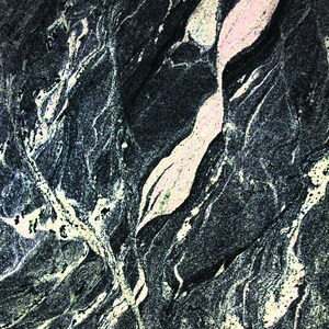 May include: Close-up of a black and white marble surface with swirling patterns. The marble has a light pink vein running through it.