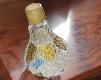 Very unusual Rare, embossed glass perfume bottle.