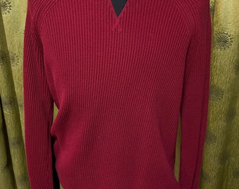 pull rouge Burberry vintage en très bon état et parfait pour l'hiver