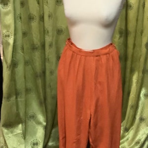 Orange patterned trousers