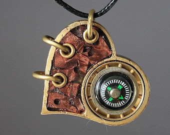 Beautiful steampunk pendant - heart. decorated with natural stones - turquoise and a real compass.