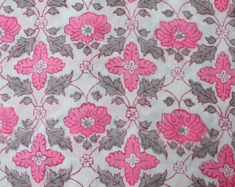 May include: A white fabric with a pink and gray floral pattern. The flowers are stylized and have a delicate, feminine look.