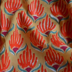 Mughal yellow and orange floral hand block print cotton fabric from India sold by the yard.