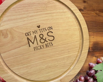 Off my tits on picky bits round Chopping Board