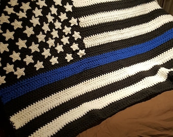 Dun blauw lijnvlagdekenpatroon