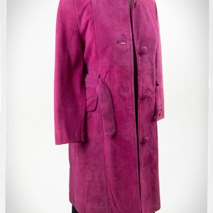 From Oshawa66Vintage.com online consignment store and luxury resale vintage clothing for men and ladies. Vintage 60s-70s mod style dark hot pink kid suede coat with a low profile mandarin collar.