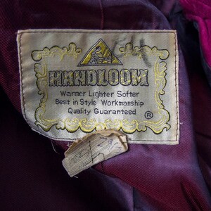 From Oshawa66Vintage.com online consignment store and luxury resale vintage clothing for men and ladies. Vintage 60s-70s mod style dark hot pink kid suede coat with a low profile mandarin collar.