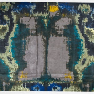 May include: Abstract patterned fabric in shades of blue, green, and gray. The fabric has a subtle sheen and a soft, flowing texture.