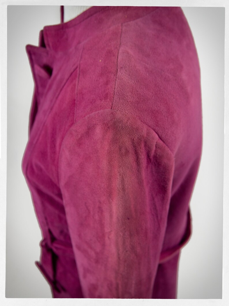 From Oshawa66Vintage.com online consignment store and luxury resale vintage clothing for men and ladies. Vintage 60s-70s mod style dark hot pink kid suede coat with a low profile mandarin collar.