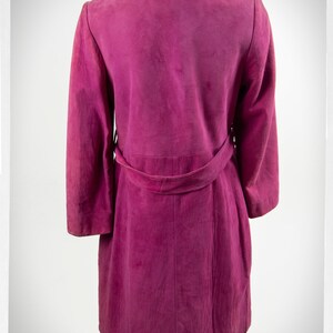 From Oshawa66Vintage.com online consignment store and luxury resale vintage clothing for men and ladies. Vintage 60s-70s mod style dark hot pink kid suede coat with a low profile mandarin collar.
