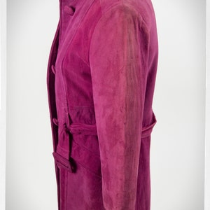 From Oshawa66Vintage.com online consignment store and luxury resale vintage clothing for men and ladies. Vintage 60s-70s mod style dark hot pink kid suede coat with a low profile mandarin collar.