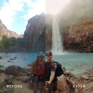 May include: A couple poses for a selfie in front of a waterfall in a canyon. The water is a vibrant blue and the rocks are brown. The couple is wearing casual clothing and smiling.