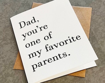 May include: A white card with black text that reads "Dad, you're one of my favorite parents."