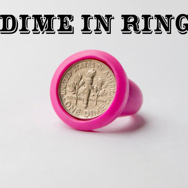 Regalo de broma: moneda de diez centavos en un anillo