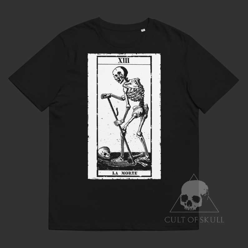 May include: Black t-shirt with a white graphic of a tarot card depicting Death, a skeleton holding a scythe, with the text "XIII LA MORTE" below. The bottom of the shirt has the text "CULT OF SKULL" in white.
