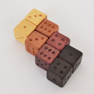 Handcrafted dice made out of Wenge, Purpleheart, Tuliwood and Yellowheart