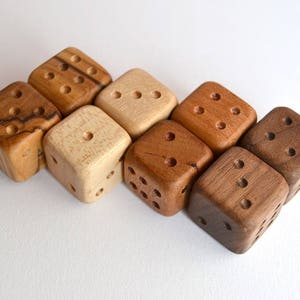 Wooden dice handmade out of Walnut, Olive, Cherry and Maple,