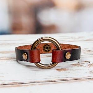 Leather cuff bracelet with 1" antique brass ring.