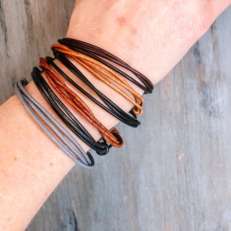 2mm leather cord bracelet group picture of color options on wrist