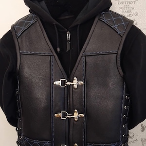 Biker vest. Patch vest. Leather: black 1.7-1.8mm thick,vest made with blue threads. Handmade.