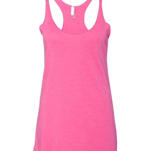May include: A pink racerback tank top with a scoop neck. The tank top is made of a soft, comfortable fabric and has a relaxed fit.